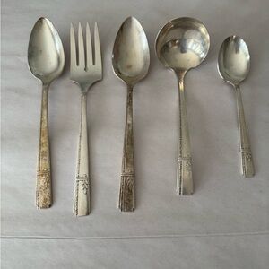 Variety vintage silverware serving assortment